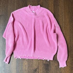 Pistola sweater with distressed edge.